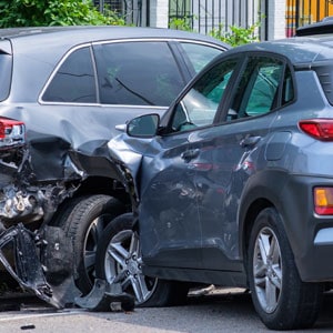 A damaged car after colliding with another vehicle.